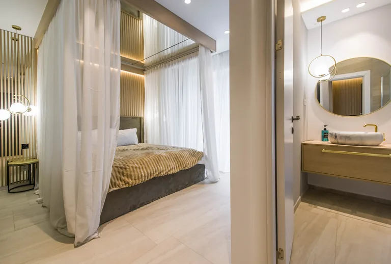 VIP Room at MAPAMONT guesthouse, with a canopy bed, Văliug